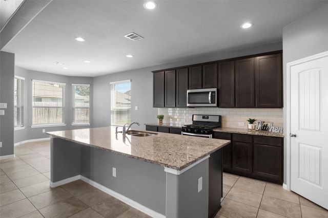 21674 Tea Tree Olive Place, Porter, TX 77365