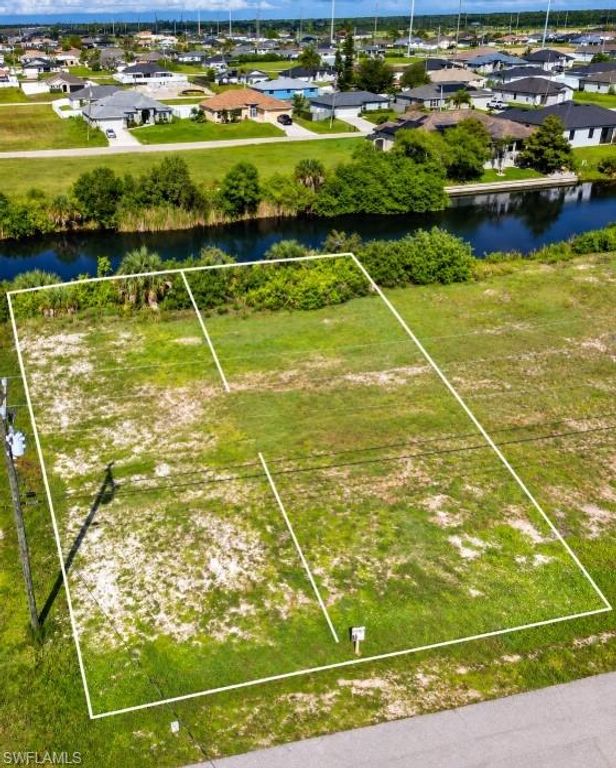 3024 NE 6th AVE, CAPE CORAL, FL 33909 — photo 2