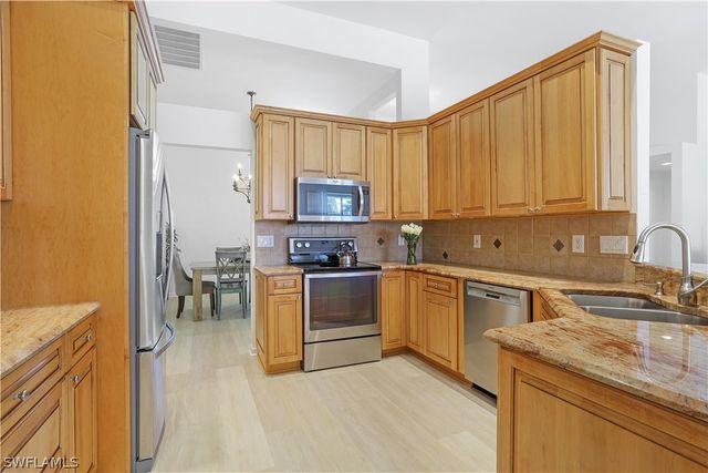 7699 Groves RD, Naples, FL 34109