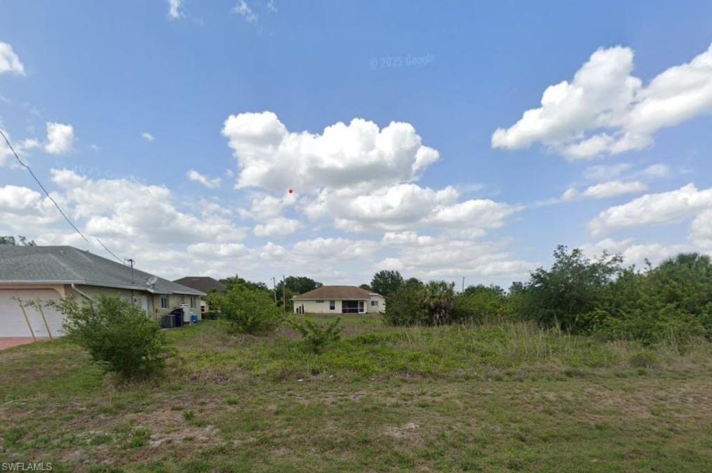 815 Milwaukee BLVD, LEHIGH ACRES, FL 33974 — exterior