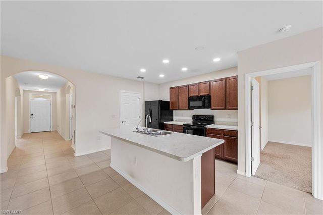 10528 Canal Brook LN, Lehigh Acres, FL 33936