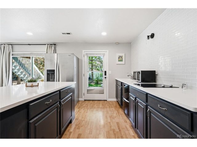 8927 Green Meadows Ln, Highlands Ranch, CO 80126