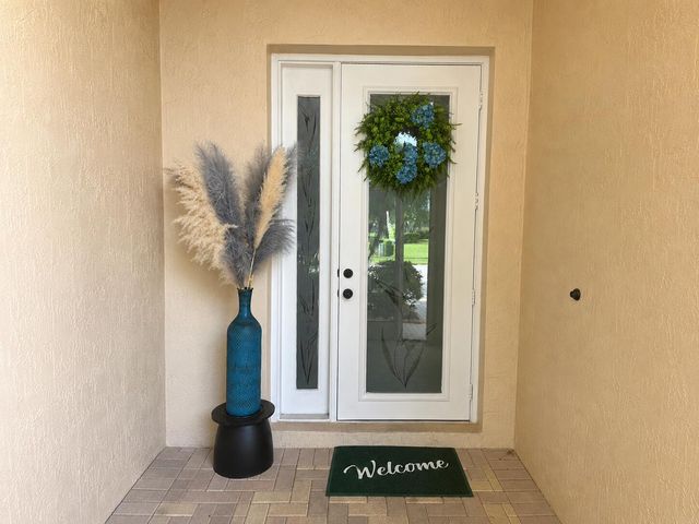 9660 EGRET CHASE Lane, West Palm Beach, FL 33411