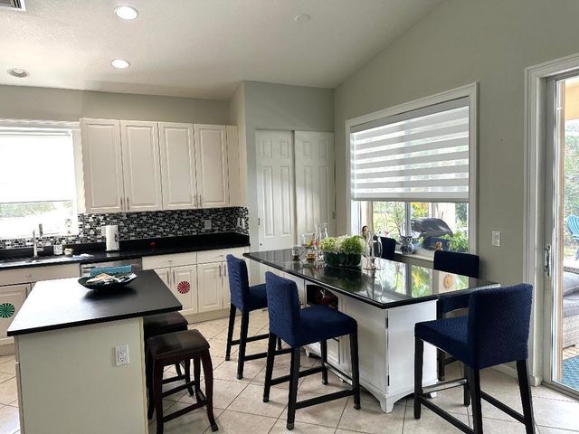 9660 EGRET CHASE Lane, West Palm Beach, FL 33411