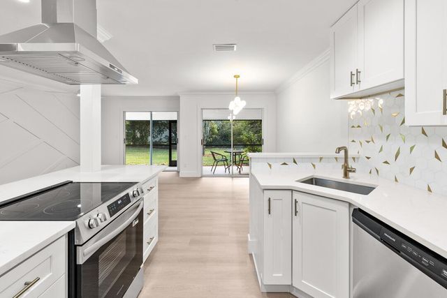 652 NE Wax Myrtle Way, Jensen Beach, FL 34957