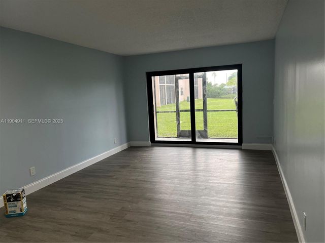 10466 Sunrise Lakes Boulevard 108, Sunrise, FL 33322