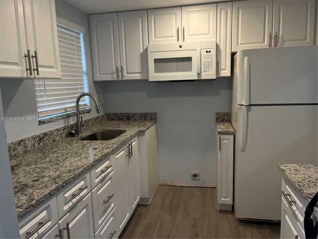 10466 Sunrise Lakes Boulevard 108, Sunrise, FL 33322