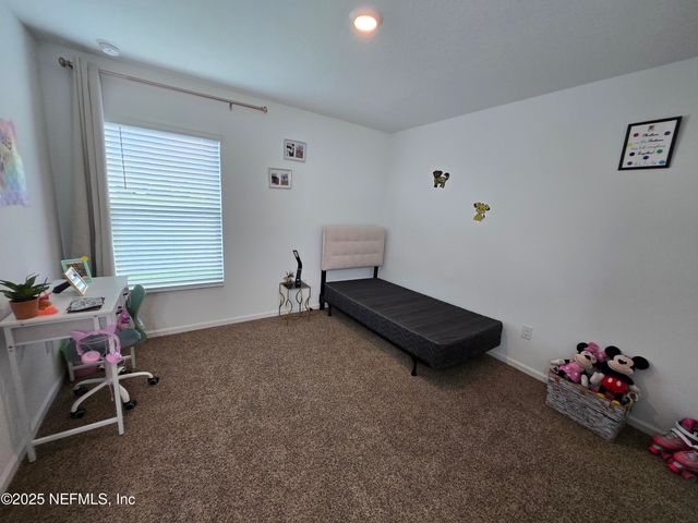 32 HULETT WOODS Road, Palm Coast, FL 32137