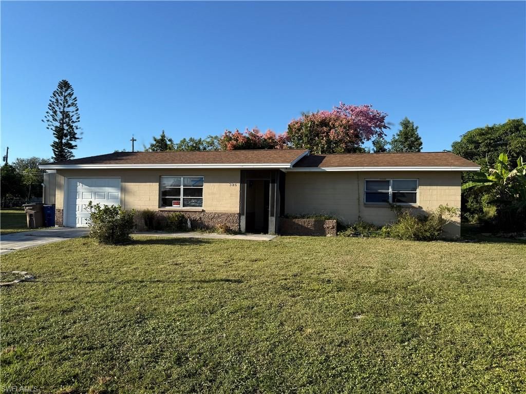326 Morgan CIR N, LEHIGH ACRES, FL 33936 — exterior