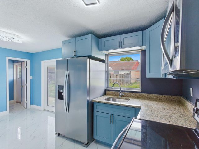 5669 S 35th Court, Greenacres, FL 33463