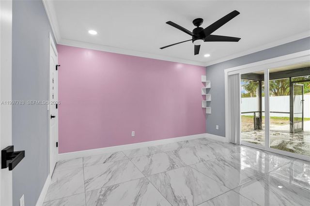 702 NW Orchid St, Port St. Lucie, FL 34983