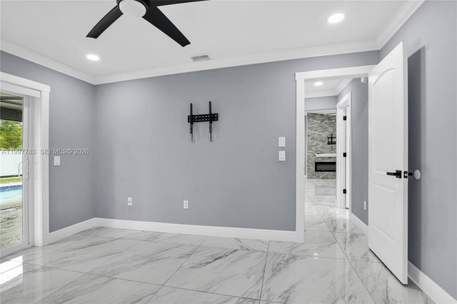 702 NW Orchid St, Port St. Lucie, FL 34983