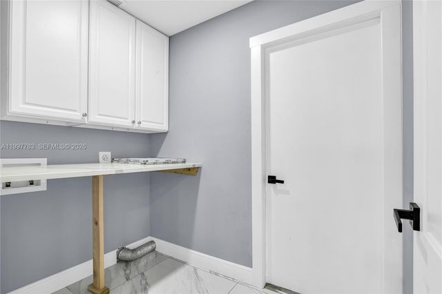 702 NW Orchid St, Port St. Lucie, FL 34983