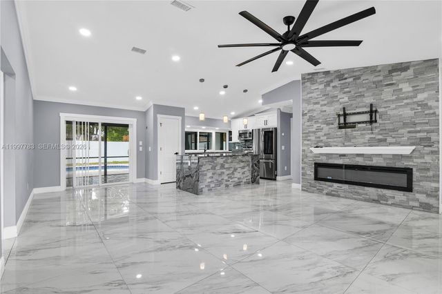 702 NW Orchid St, Port St. Lucie, FL 34983