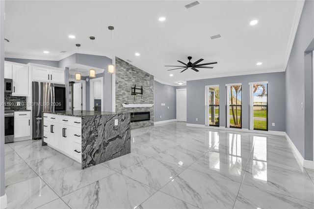 702 NW Orchid St, Port St. Lucie, FL 34983