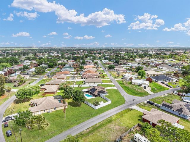 702 NW Orchid St, Port St. Lucie, FL 34983