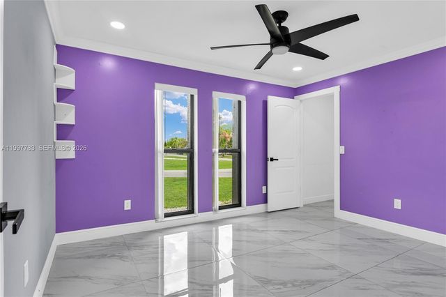 702 NW Orchid St, Port St. Lucie, FL 34983