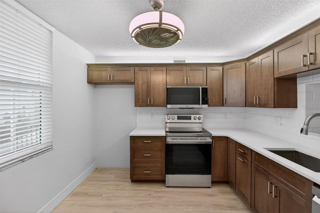 7645 SUN ISLAND DRIVE S 103, South Pasadena, FL 33707