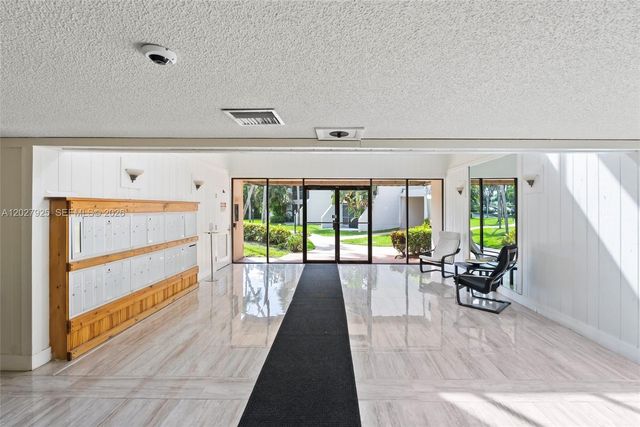 301 Racquet Club Road 103, Weston, FL 33326