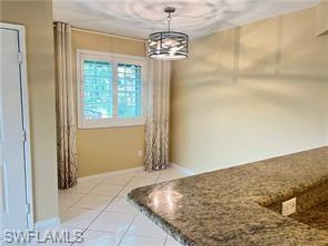 1265 Wildwood Lakes BLVD 201, Naples, FL 34104