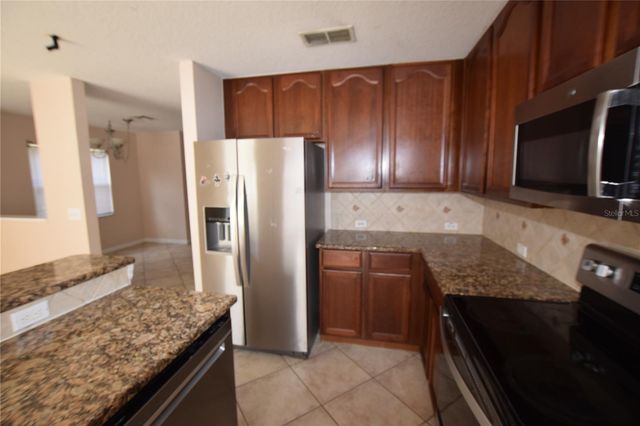 13098 LEXINGTON SUMMIT STREET, Orlando, FL 32828