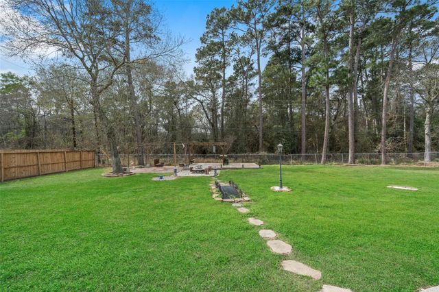 2438 Ripplewood Drive, Conroe, TX 77384