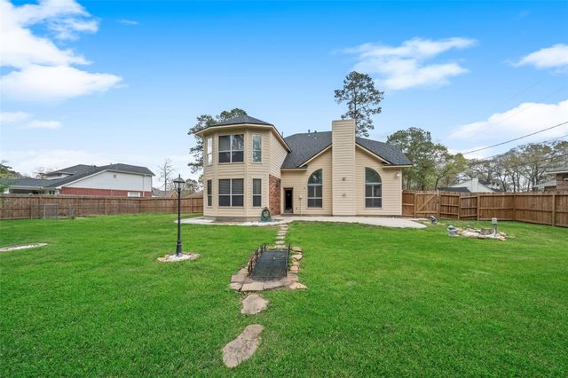 2438 Ripplewood Drive, Conroe, TX 77384