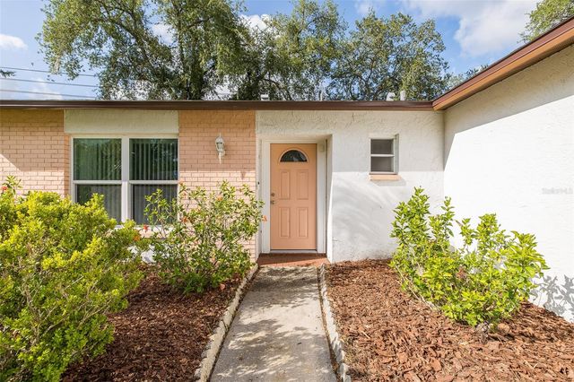 8240 WINDING WOOD DRIVE, Port Richey, FL 34668