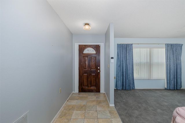 8240 WINDING WOOD DRIVE, Port Richey, FL 34668