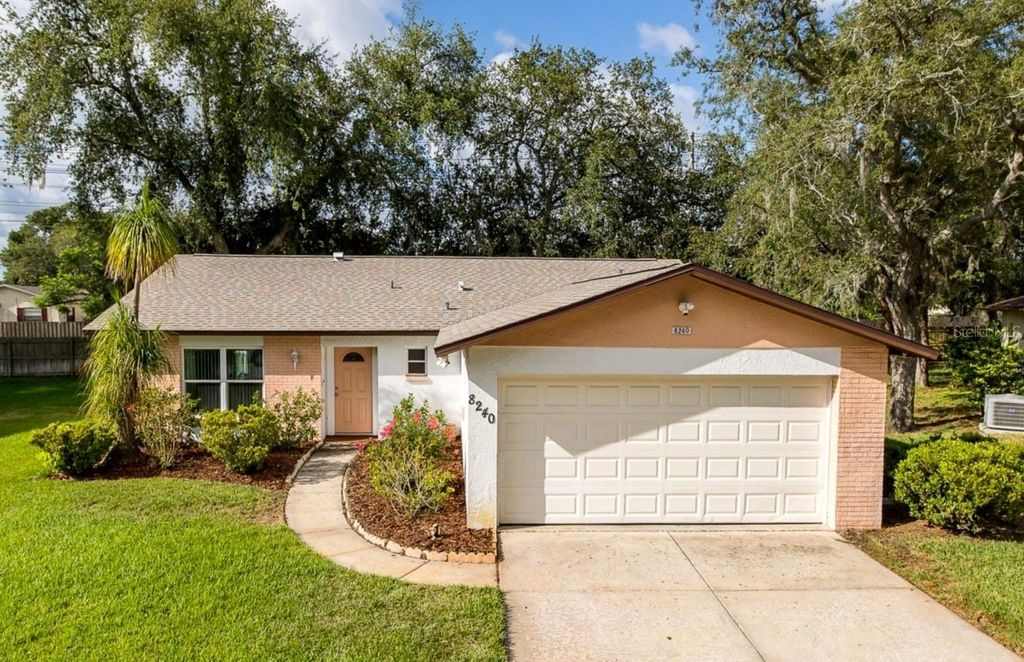 Image 1 of property listing at 8240 WINDING WOOD DRIVE, Port Richey, FL 34668