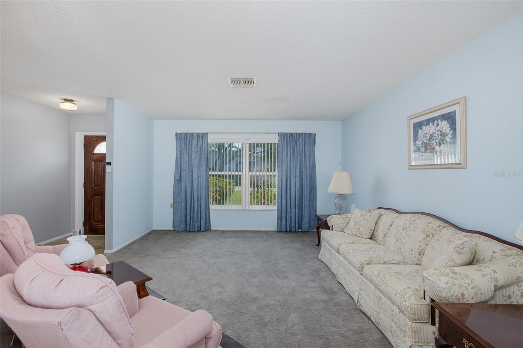 Image 4 of property listing at 8240 WINDING WOOD DRIVE, Port Richey, FL 34668