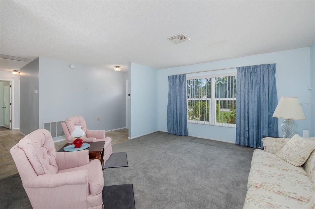 Image 5 of property listing at 8240 WINDING WOOD DRIVE, Port Richey, FL 34668