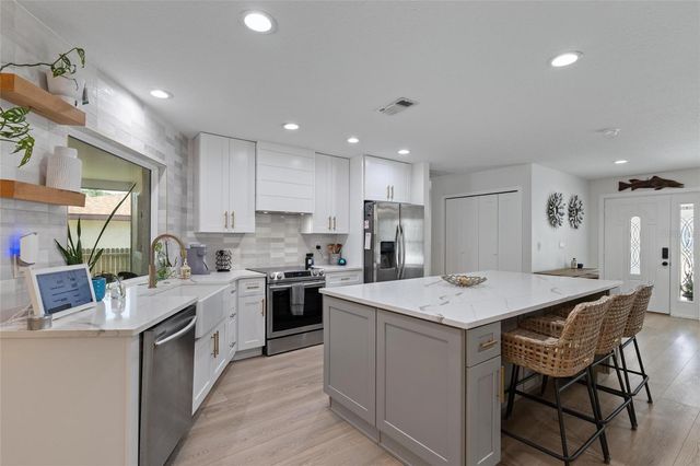 1128 FORBES TRACE, Tarpon Springs, FL 34689