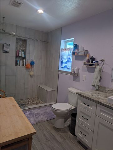 70 West Castle Oak Lane, Rockport, TX 78382