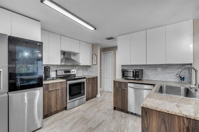 16230 NW 84th Court, Miami Lakes, FL 33016