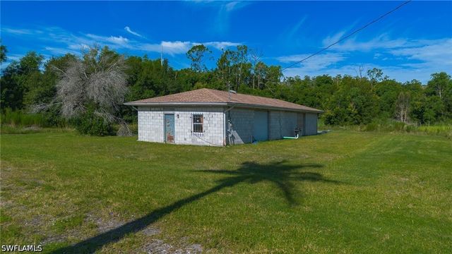925 Purple Martin DR, Naples, FL 34120