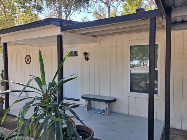 212 Magnolia Point Drive, Houston, TX 77336