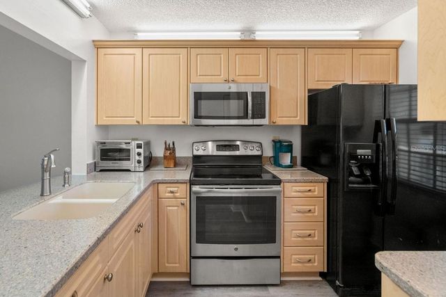 1438 MILLSTREAM LANE 203, Dunedin, FL 34698