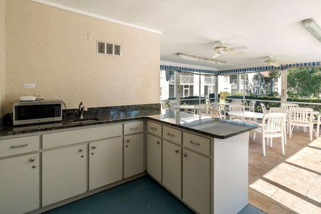 1438 MILLSTREAM LANE 203, Dunedin, FL 34698