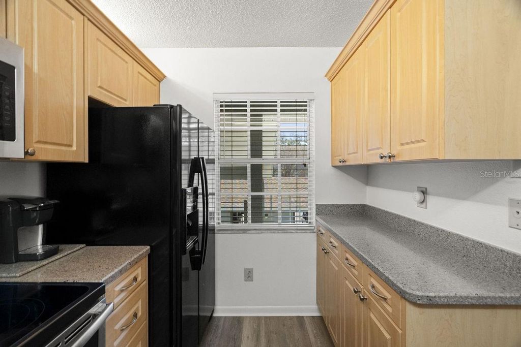 Image 12 of property listing at 1438 MILLSTREAM LANE 203, Dunedin, FL 34698