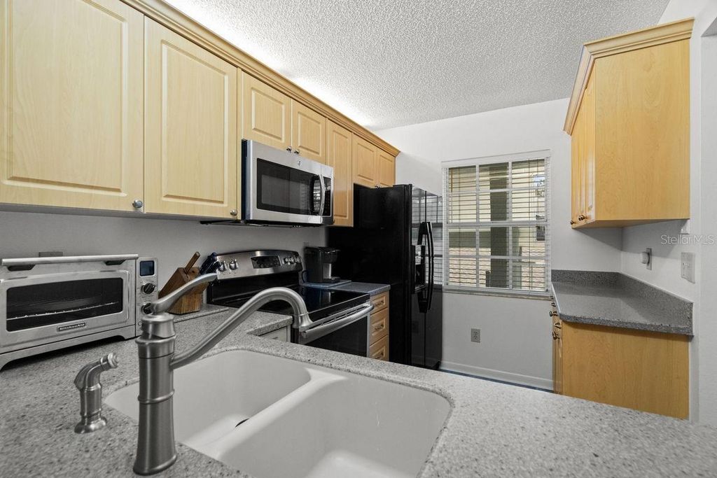 Image 14 of property listing at 1438 MILLSTREAM LANE 203, Dunedin, FL 34698