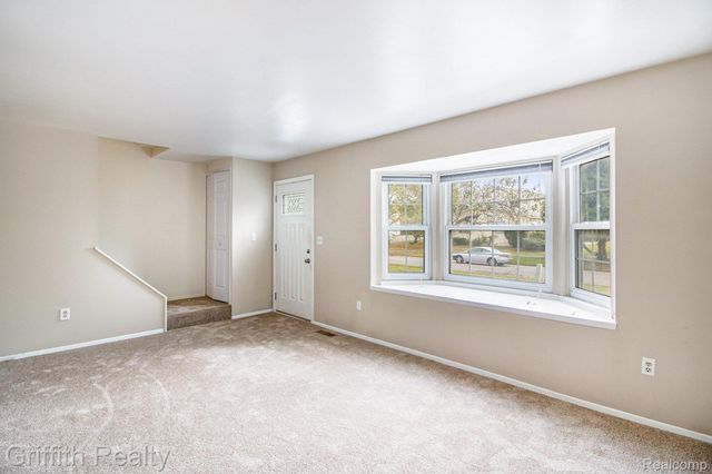 229 Lake Village Drive, Walled Lake, MI 48390