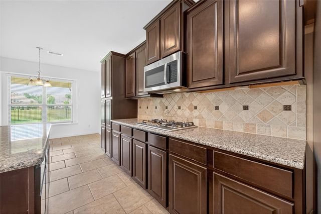 83 W Wading Pond Circle, The Woodlands, TX 77375
