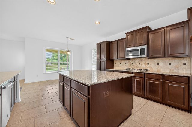 83 W Wading Pond Circle, The Woodlands, TX 77375