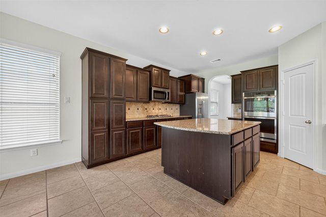 83 W Wading Pond Circle, The Woodlands, TX 77375
