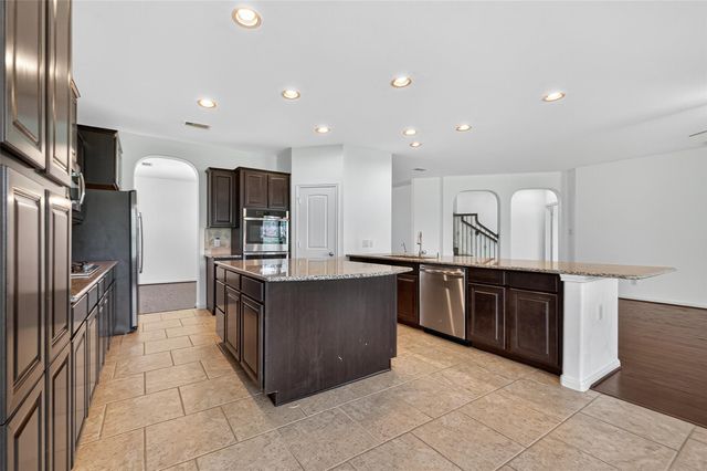 83 W Wading Pond Circle, The Woodlands, TX 77375