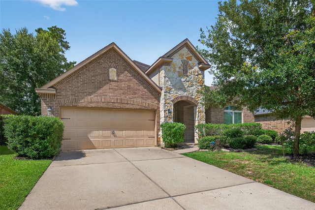 83 W Wading Pond Circle, The Woodlands, TX 77375
