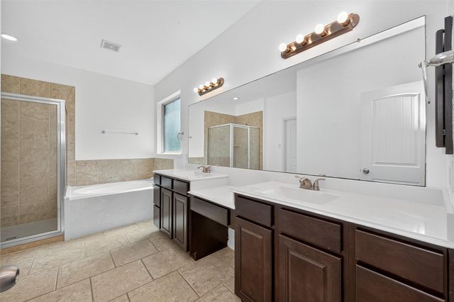 83 W Wading Pond Circle, The Woodlands, TX 77375