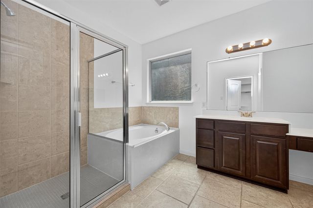 83 W Wading Pond Circle, The Woodlands, TX 77375