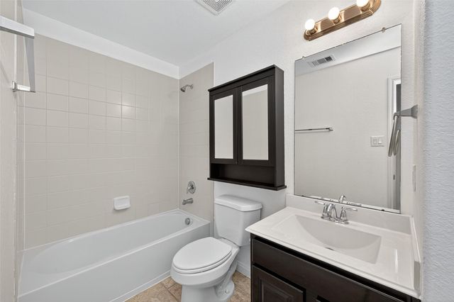 83 W Wading Pond Circle, The Woodlands, TX 77375